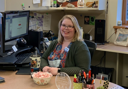 woman sitting at office desk