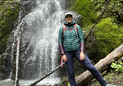 Photo of woman by waterfall
