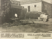newspaper clipping showing the exterior of the library under construction 