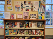 A bookshelf with books and other items on display