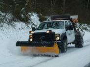 Winter snow storm street plowing