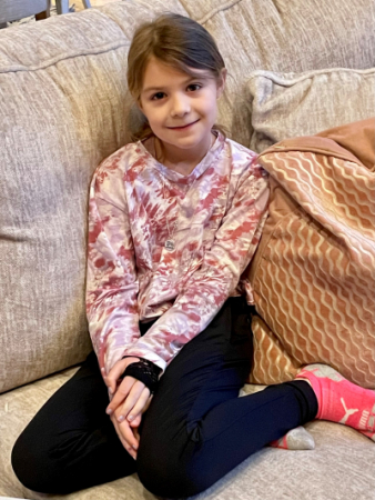 A girl sitting on a couch