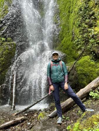 Photo of woman by waterfall