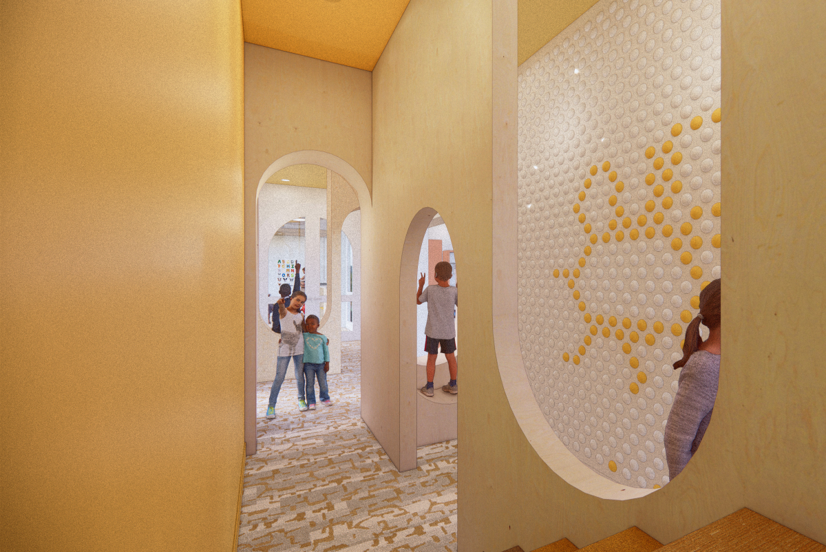 Discovery Hallway with children exploring curved cutouts and crawl spaces in a creative play environment.